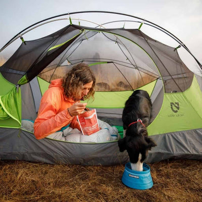 Ruffwear Bivy Travel Dog Bowl dog in tent eating out of it