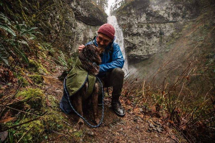 Ruffwear Sun Shower in Midnight Blue on a Dog getting a cuddle